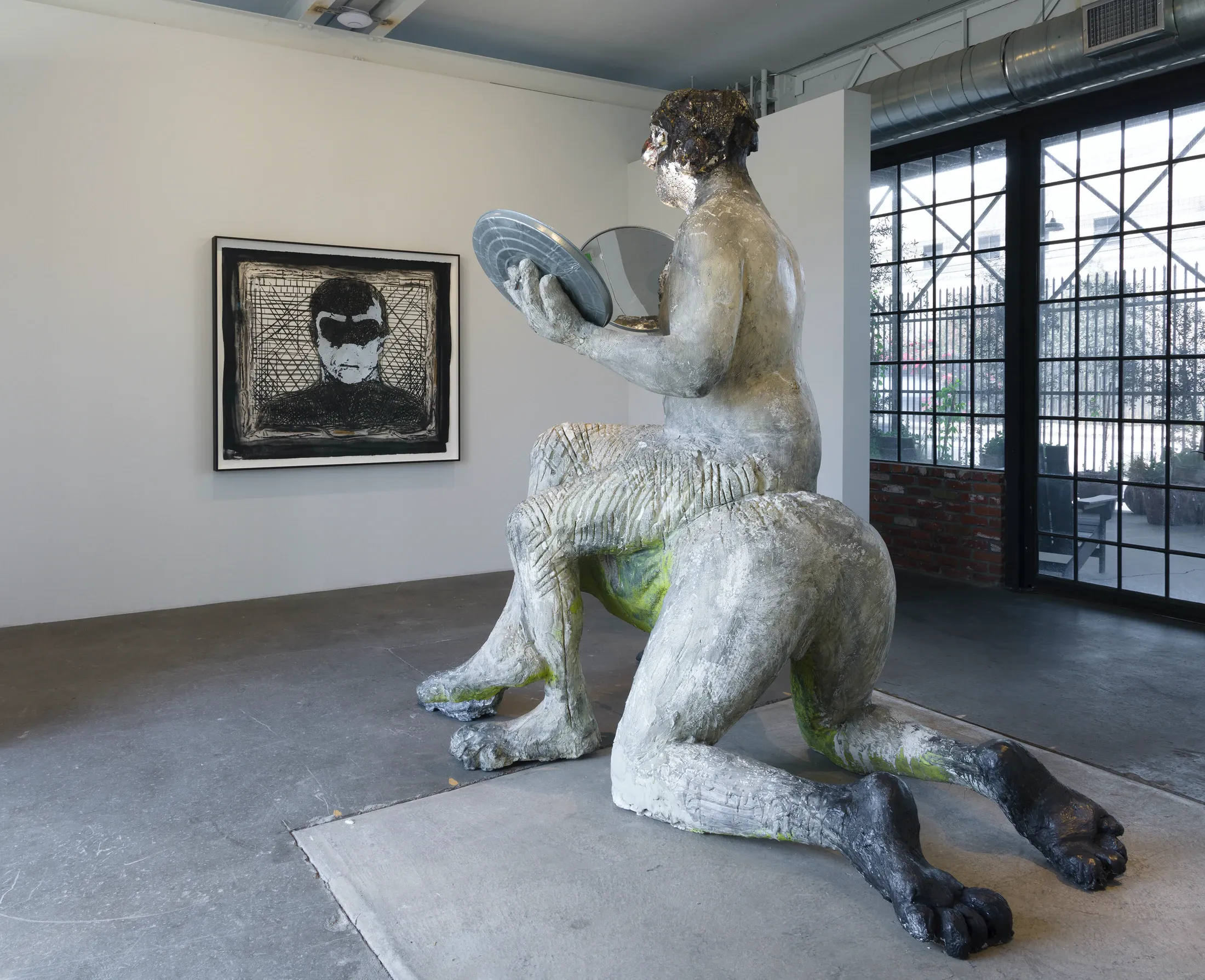 Nicole Eisenman, Man at the Center of Men at Vielmetter, photo 3