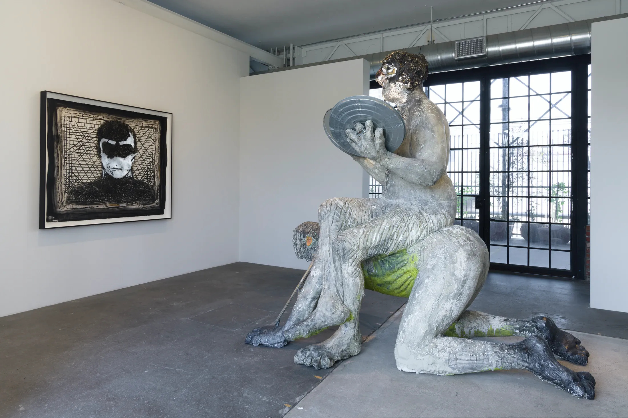Nicole Eisenman, Man at the Center of Men at Vielmetter, photo 2